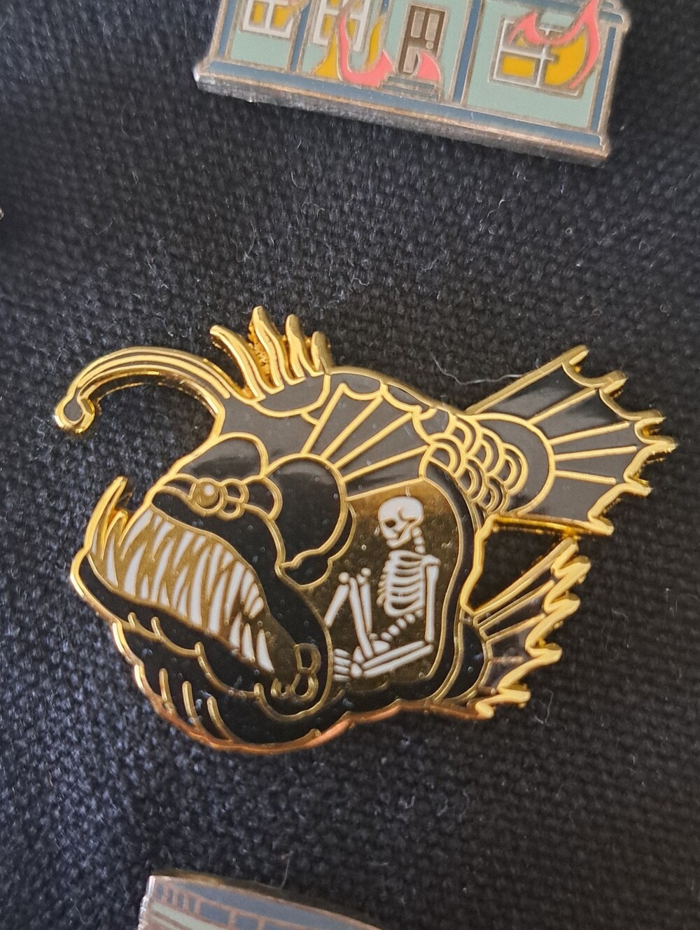 Gold and Black Anglerfish Skeleton Enamel Pin